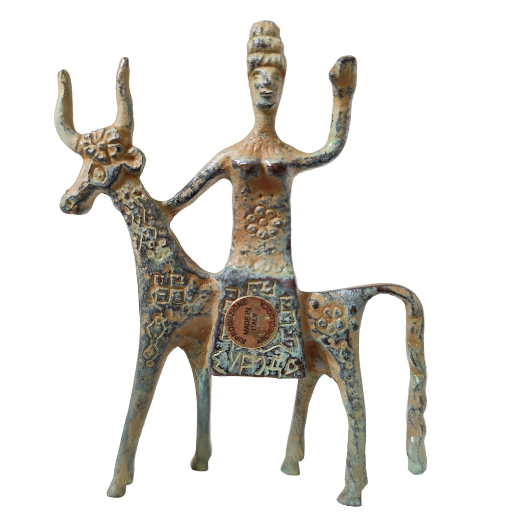 Bronze étrusque - Donna etrusca sul bue